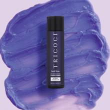 Load image into Gallery viewer, IndiGlow Conditioner laying over purple conditioner swipe